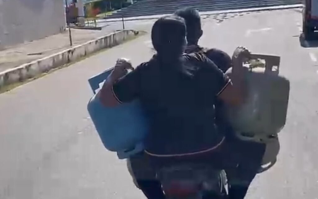 Casal é flagrado transportando botijas de gás em motocicleta no Amazonas